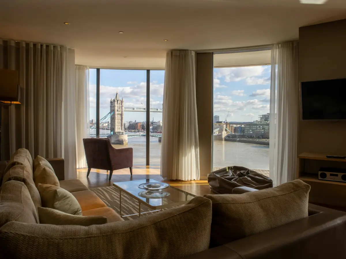Air conditioning for flats in a riverside living room with tall windows