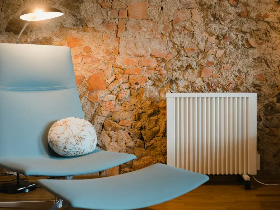 Old electric panel heater on a living room wall, ready to be replaced