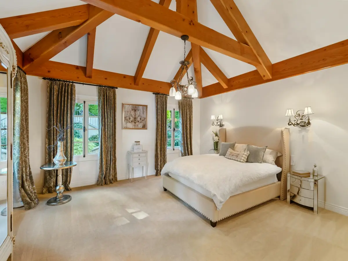 Loft air conditioning in a converted attic room with exposed timber beams