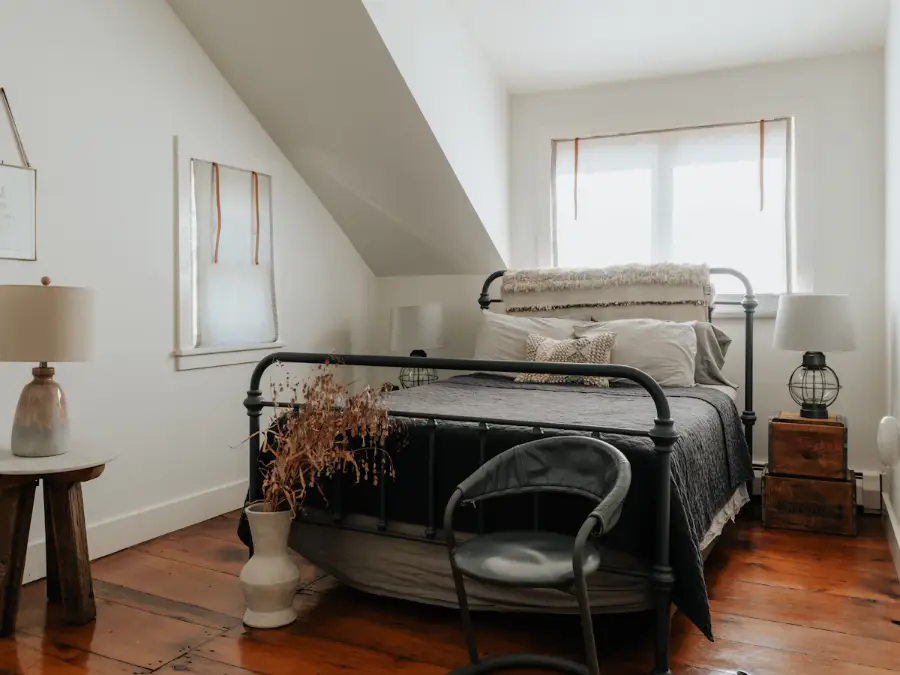 Loft conversion bedroom with a sloped ceiling