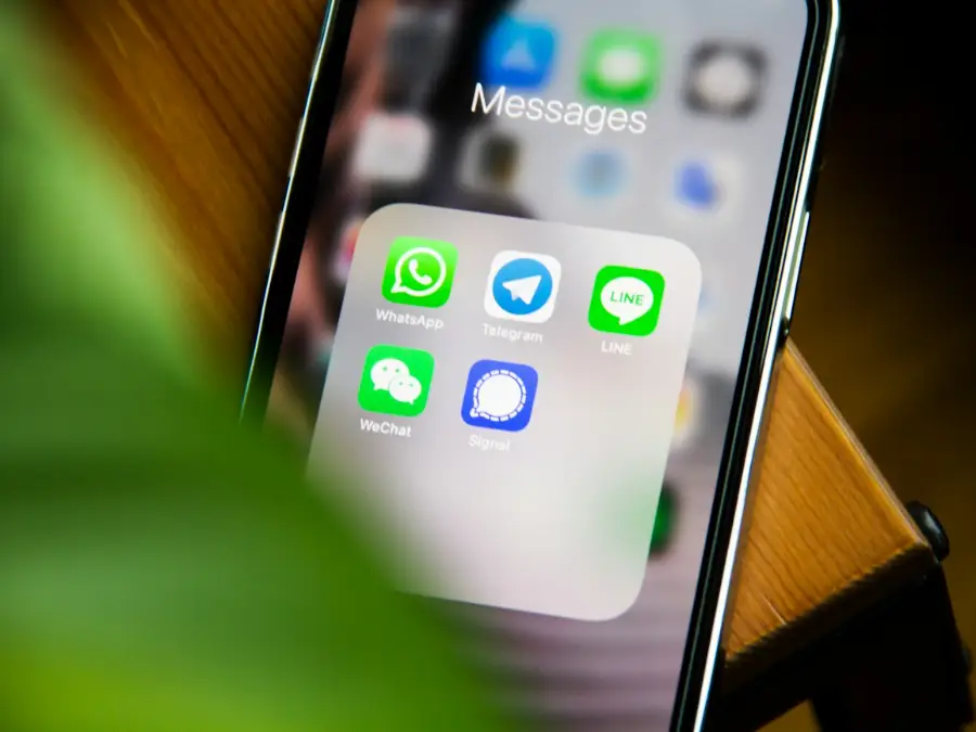 Messaging apps on a phone screen ready to send room photos