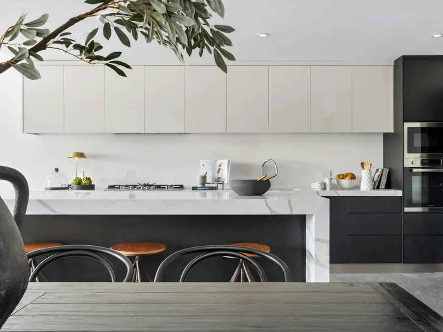 Modern kitchen with ceiling grilles that cool in summer and heat in winter
