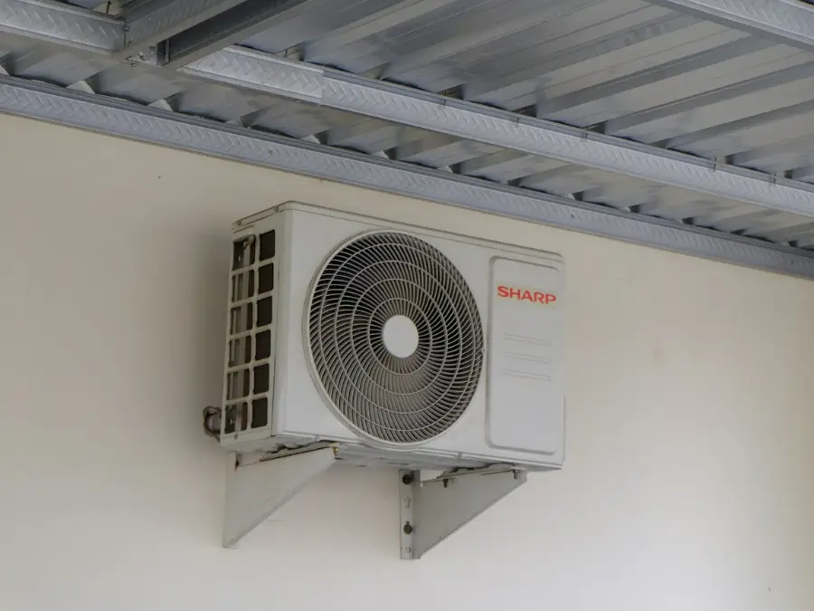 Larger outdoor condenser on a house wall with several insulated pipe runs feeding different rooms