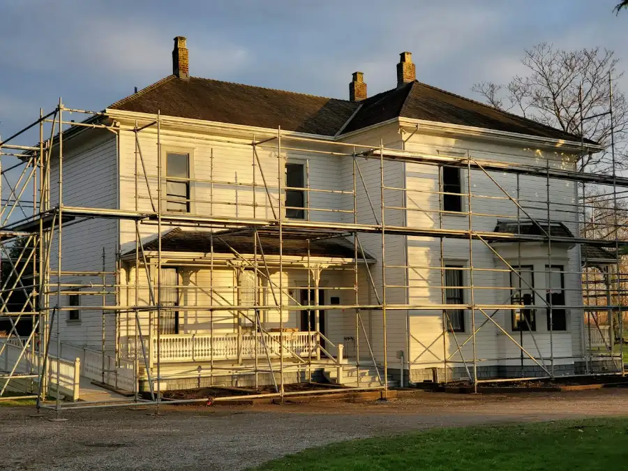 Front of a period house with tall sash windows