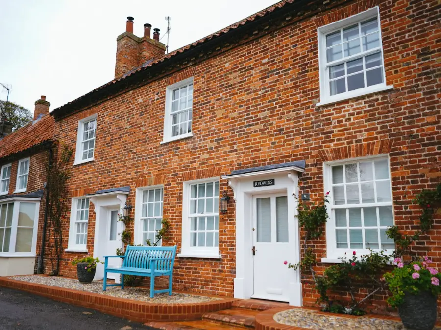 Row of brick cottages on a village lane
